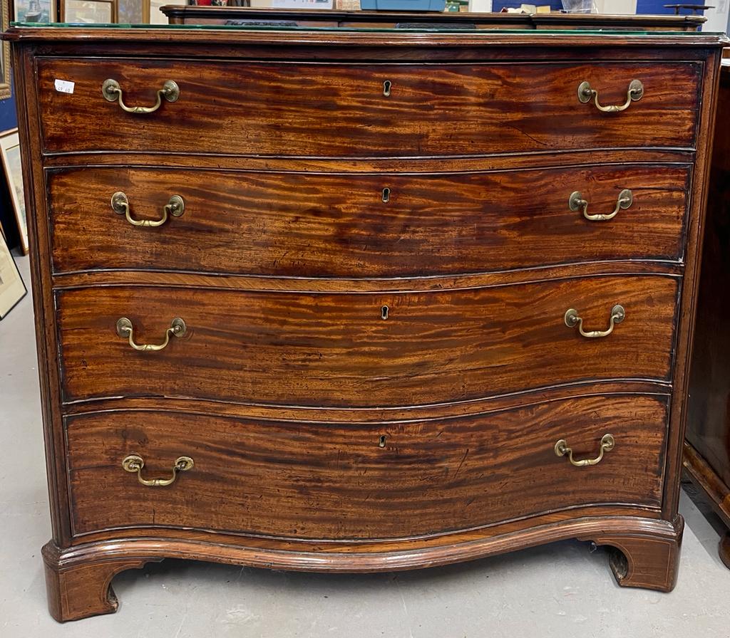 Late 18th cent. Serpentine chest of four long drawers Sold  for £2500